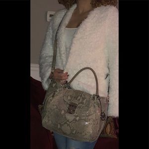 Charlotte Russe faux fur cover up. NWOT